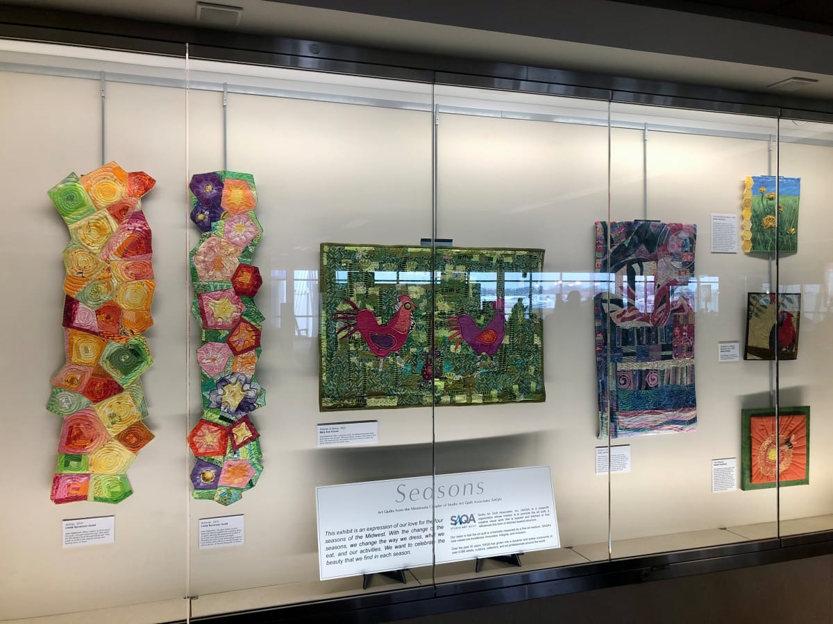 Seasons by Studio Art Quilt Associates (SAQA)  Image: Spring