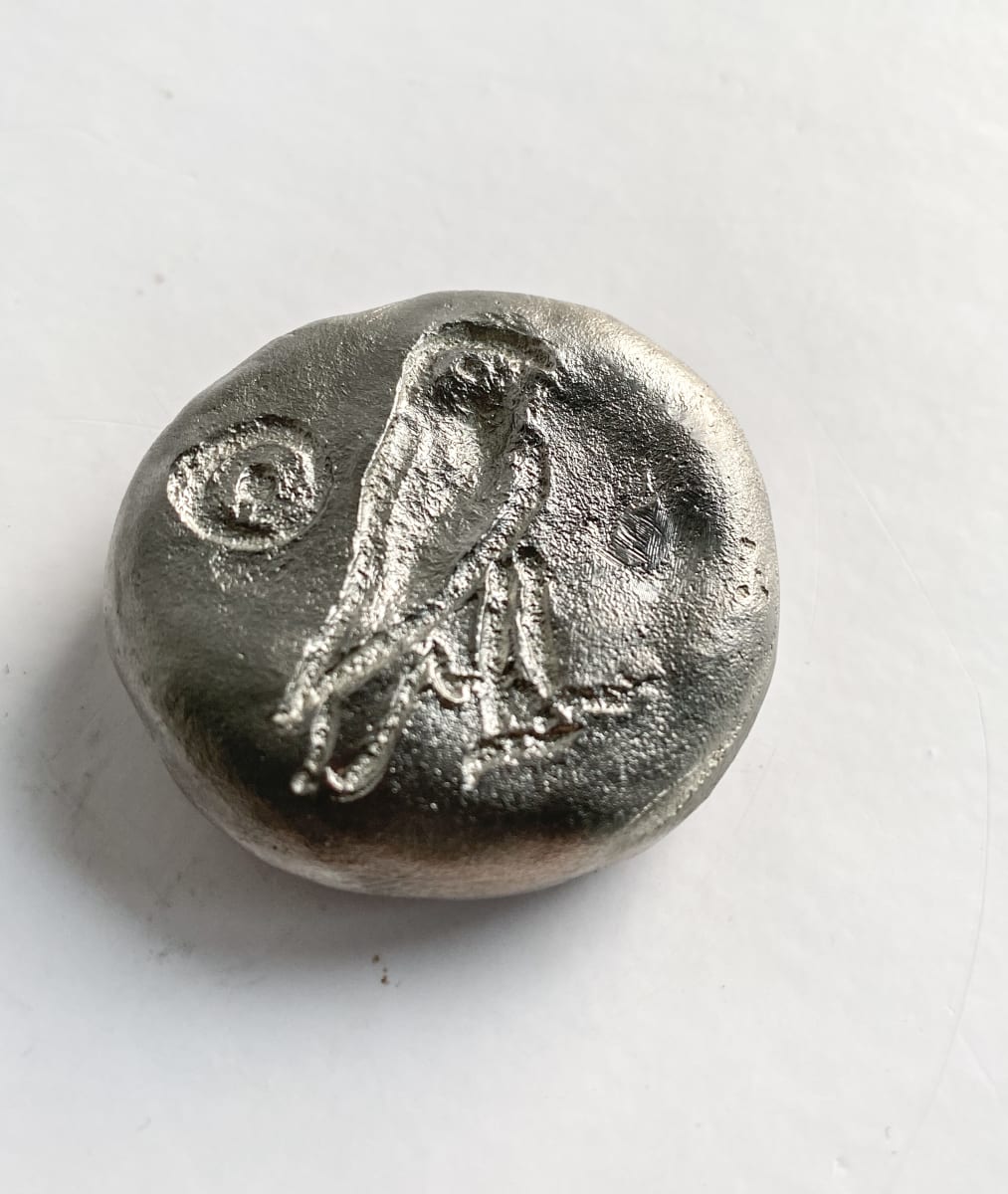 Horus tin talisman pebble by Chantal Powell  