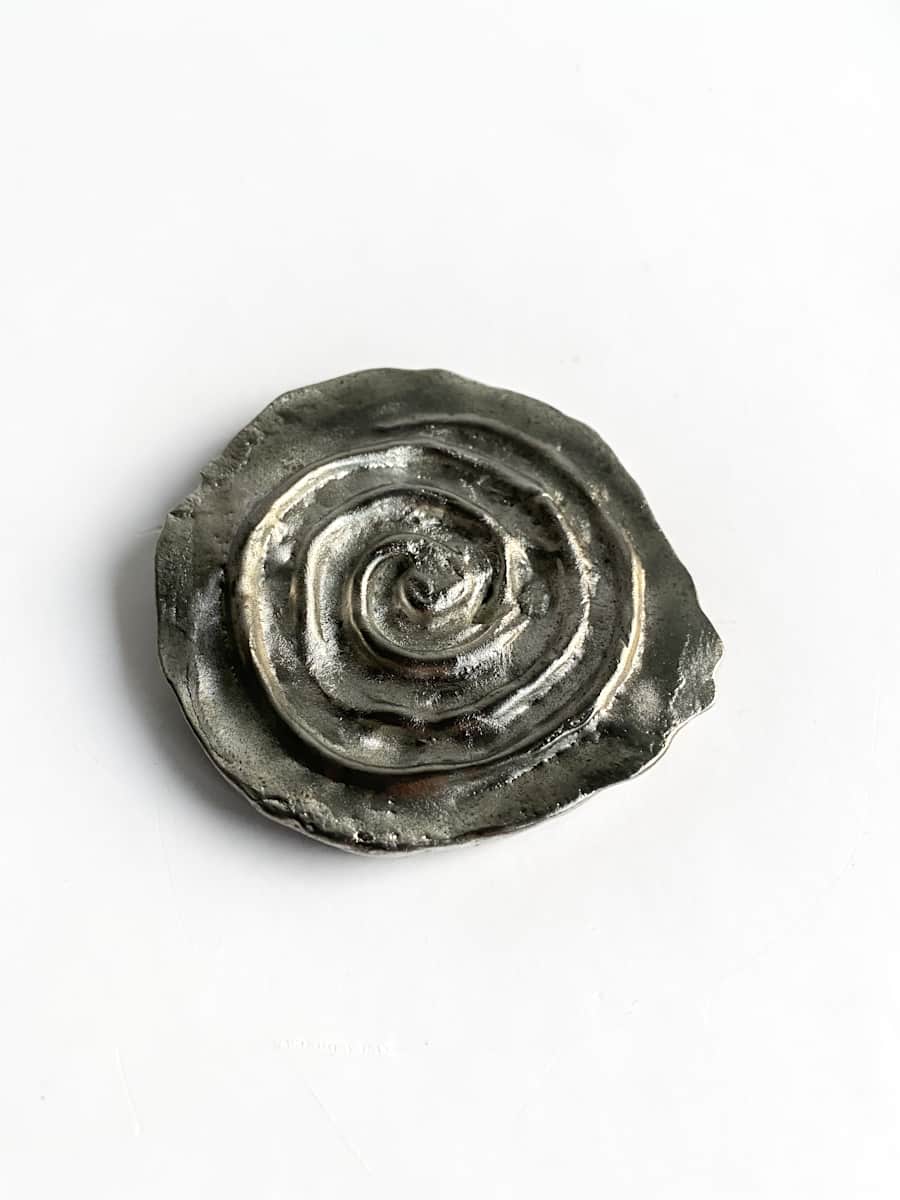 Cosmic spiral (tin talisman) by Chantal Powell 