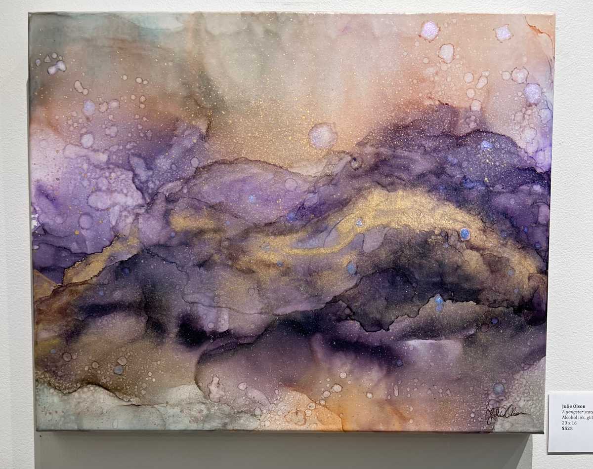 A gangster state of absurdity by Julie Olson  Image: Abstract painting. Alcohol ink, glitter ink. Color-shifting holographic ink on canvas, 16’ x 20’. Created for The Capital Gallery, Bismarck, ND, in Wild Things exhibit, March-April 2024. Currently in Creative Forces exhibit at UND Columbia Hall. 