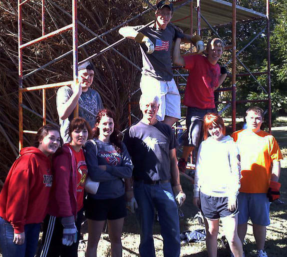 AP Sculpture with Patrick Dougherty - work on River Vessels (Cameron Park) by Diana Atwood McCutcheon  Image: West HS AP Sculpture students