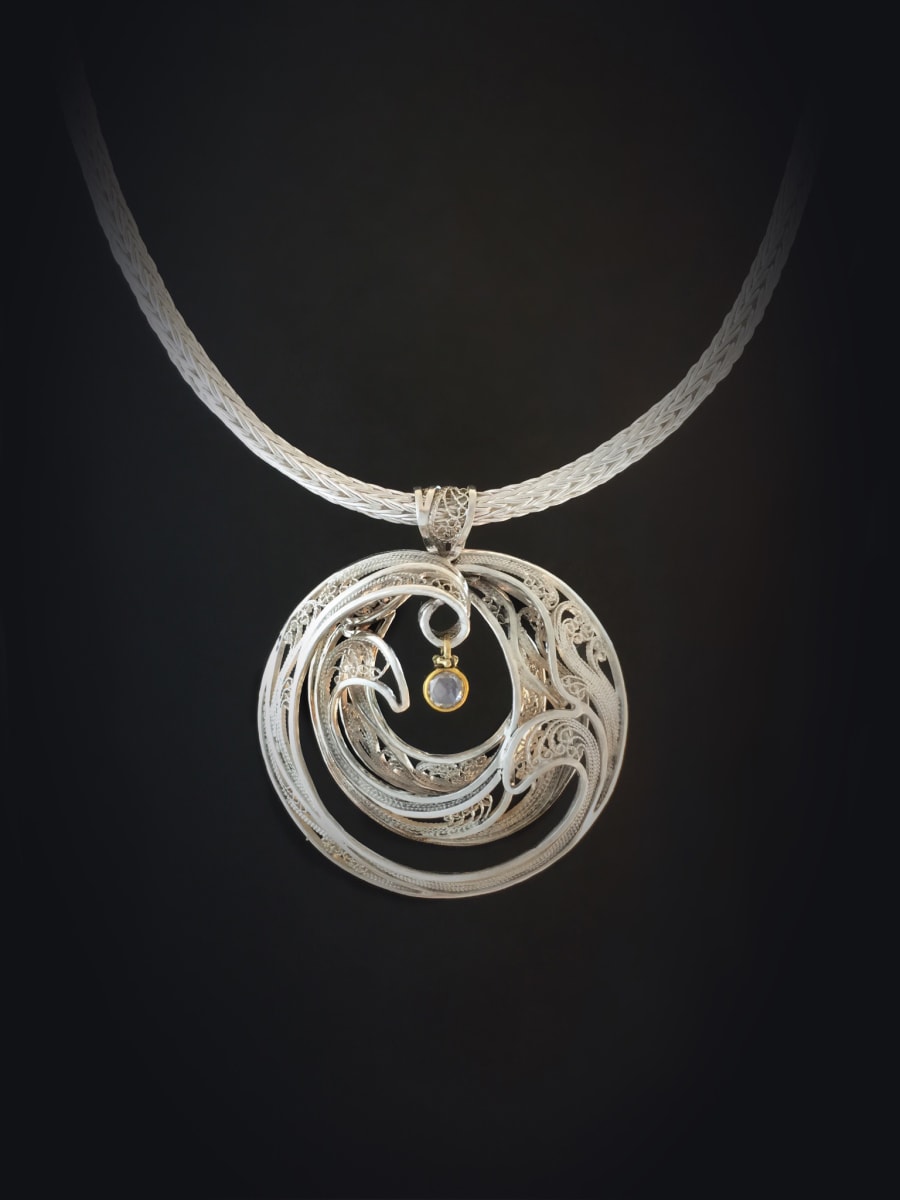 Ensparkled by Victoria Lansford  Image: 3D filigree pendant on a 2-direction double-weave loop-in-loop chain