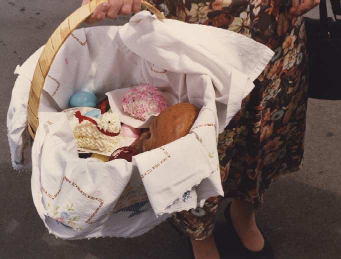 Swienconka:woman in flowered dress with basket by Marion Faller 