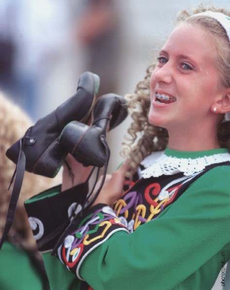Girl in school costume with braces by Jim Bush 