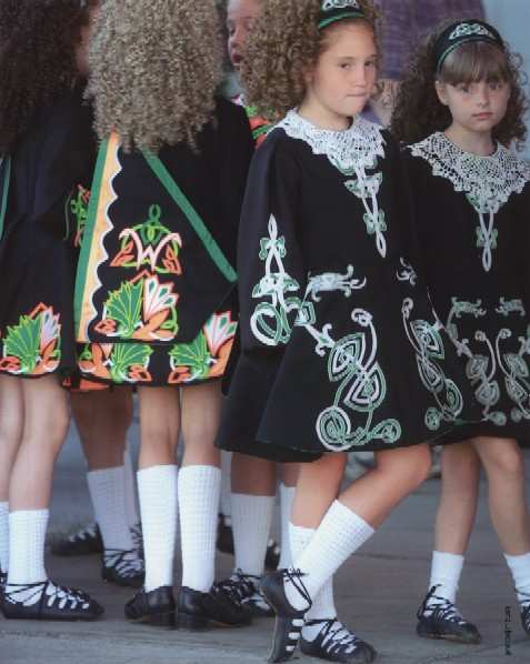 Girl in Two Styles of School Costume by Jim Bush 