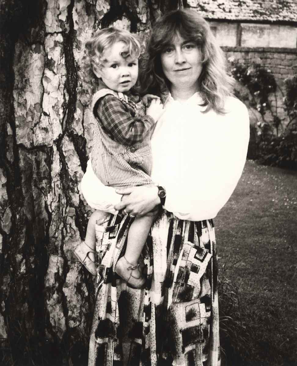 Catherine Guinness holding a Child by Andy Warhol 