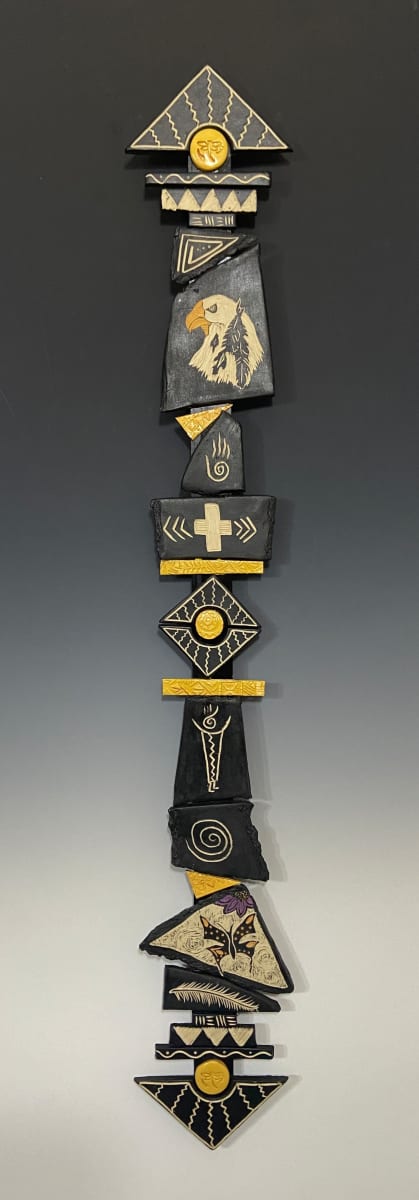 Transforming Power by Carolyn Bernard Young  Image: "Transforming Power" Totem Stick, 39 x 6 x 1", stoneware, slips, poplar