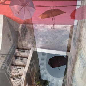 Hallucinations: Trani with Umbrellas Pink and Blue by Bonnie Levinson 