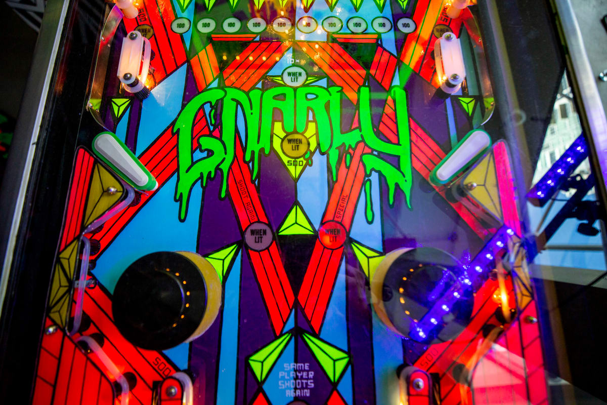"Gnarly Pinball" - Custom Painted Pinball Machine by Debbie Clapper  Image: "Gnarly Pinball" photo by Kevin J. Beaty/Denverite