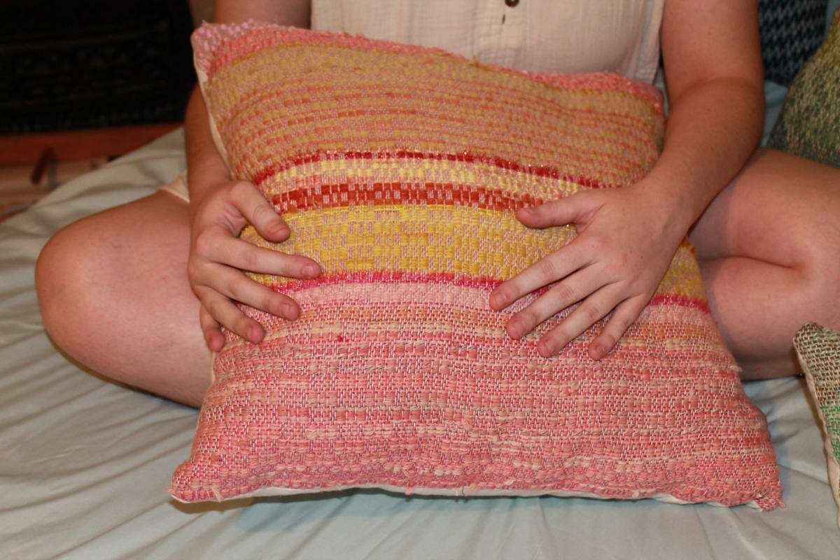 Pink Scrap Yarn Pillow by Noelani Jones 
