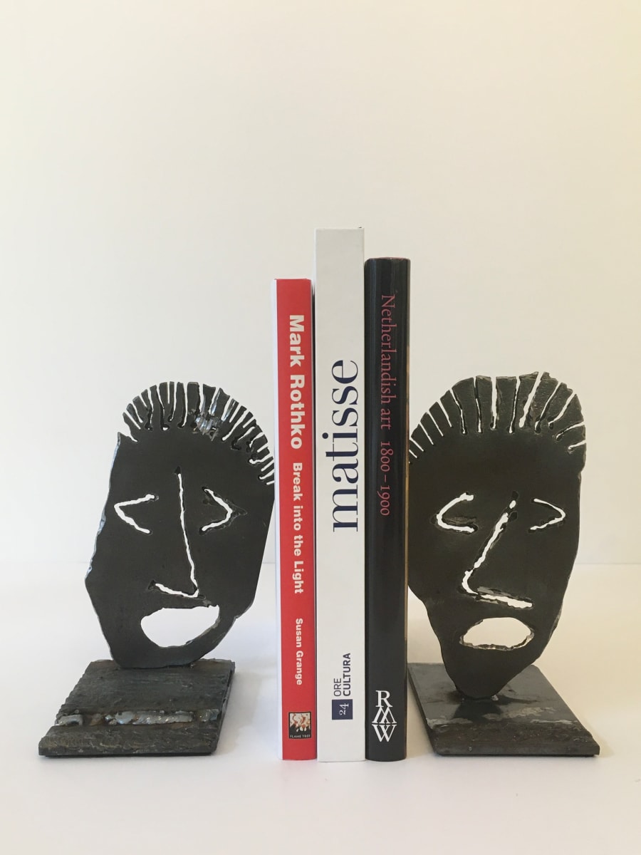 Bookend Faces by John A. Mantooth 