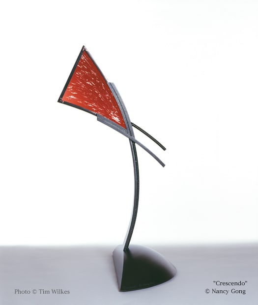 "Crescendo" from the Character Series  Image: Crescendo from the Character Series stands 38"h X 23"w X 21"deep
Flashed glass, lead, steel. Leaded and etched glass, milled and formed steel, powder coated.