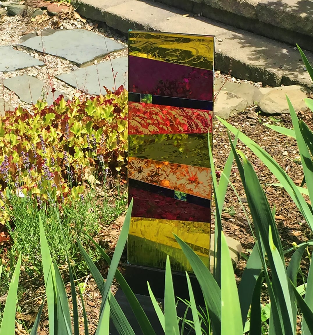 "Little Galaxy" by Nancy Gong  Image: Blown sheet glass, etched flashed glass, laminated.  For interior or exterior display.