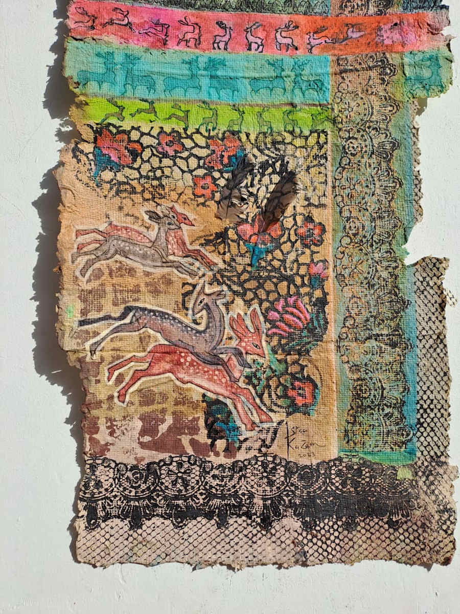 Deer are running on the mountain by Israa Kazem 