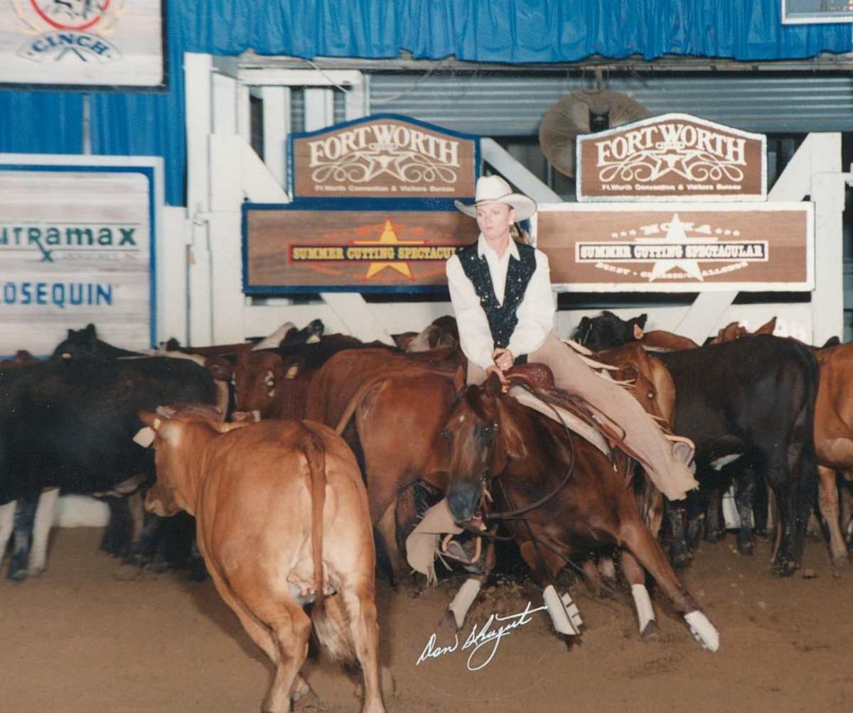 Gail Hamilton  Image: Gail Hamilton showing at the 1990 NCHA Summer Spectacular and riding Floyd Quixote. 