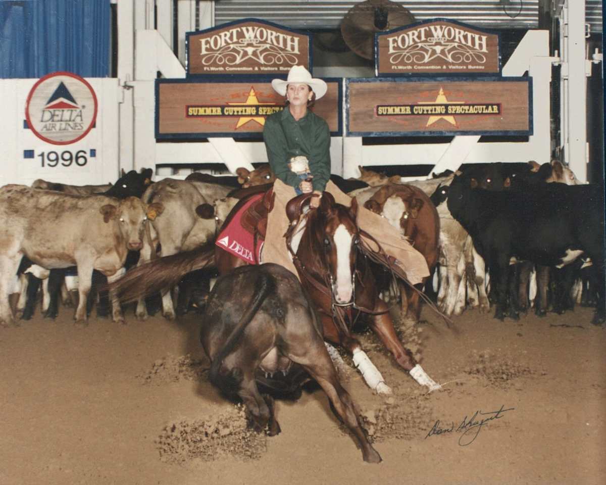 Pepper Dually  Image: Peppy Dually shown by Lainey Raivetger at the 1996 NCHA Summer Spectacular
