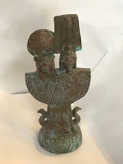 Heads of  Shu and Tefnut on a percussive instrument, a menat 