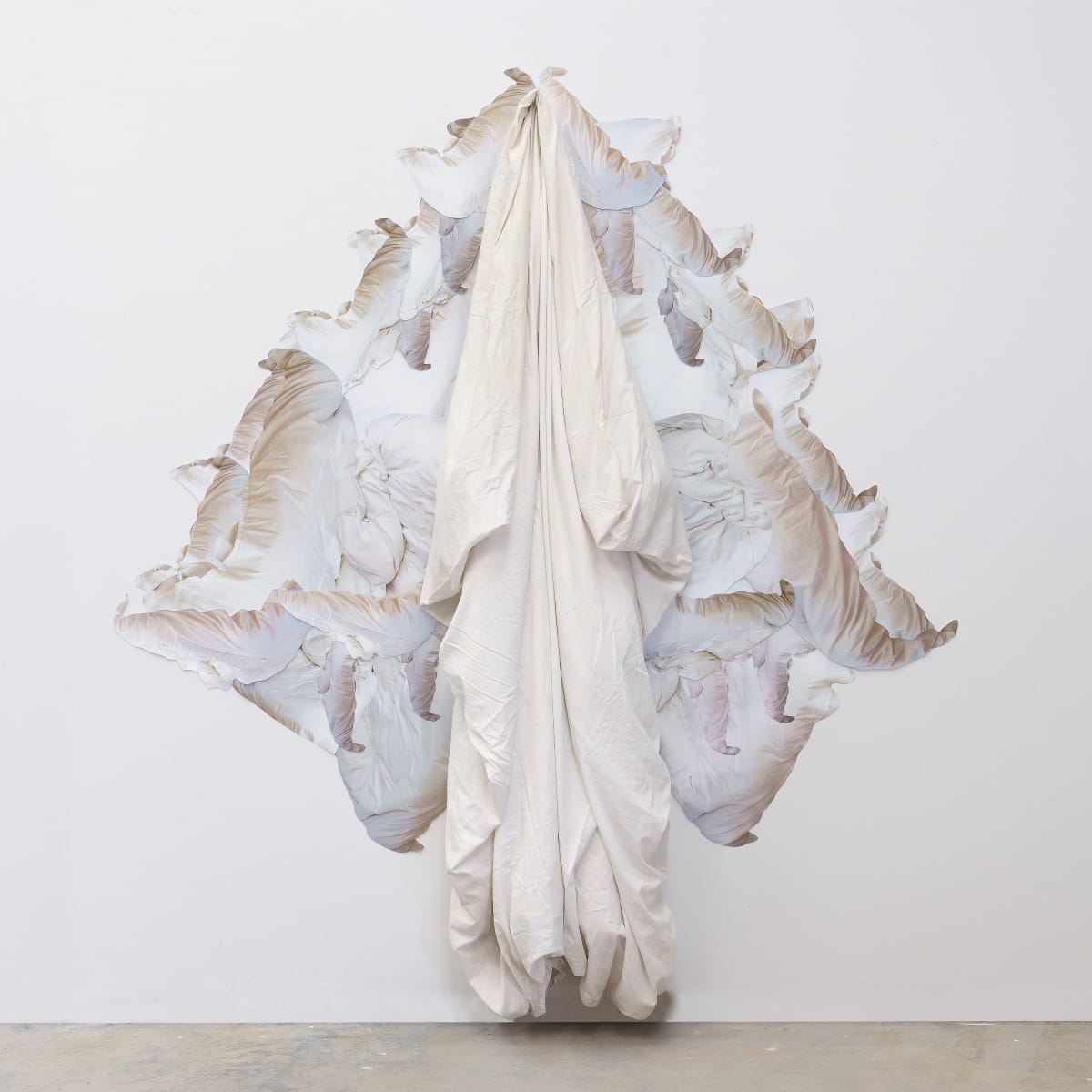 Sleeping Angel (Grieving Angel) by Mira Burack  Image: Sleeping Angel (Grieving Angel), 2020, Wall installation, goose down comforter, cotton duvet cover, photography collage (photographs of comforter), 84” x 84” x 7”