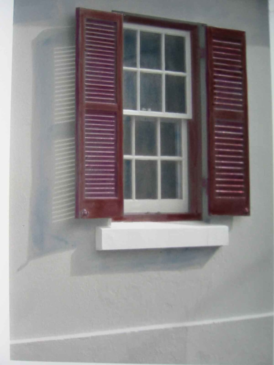 Window with red Shutters 