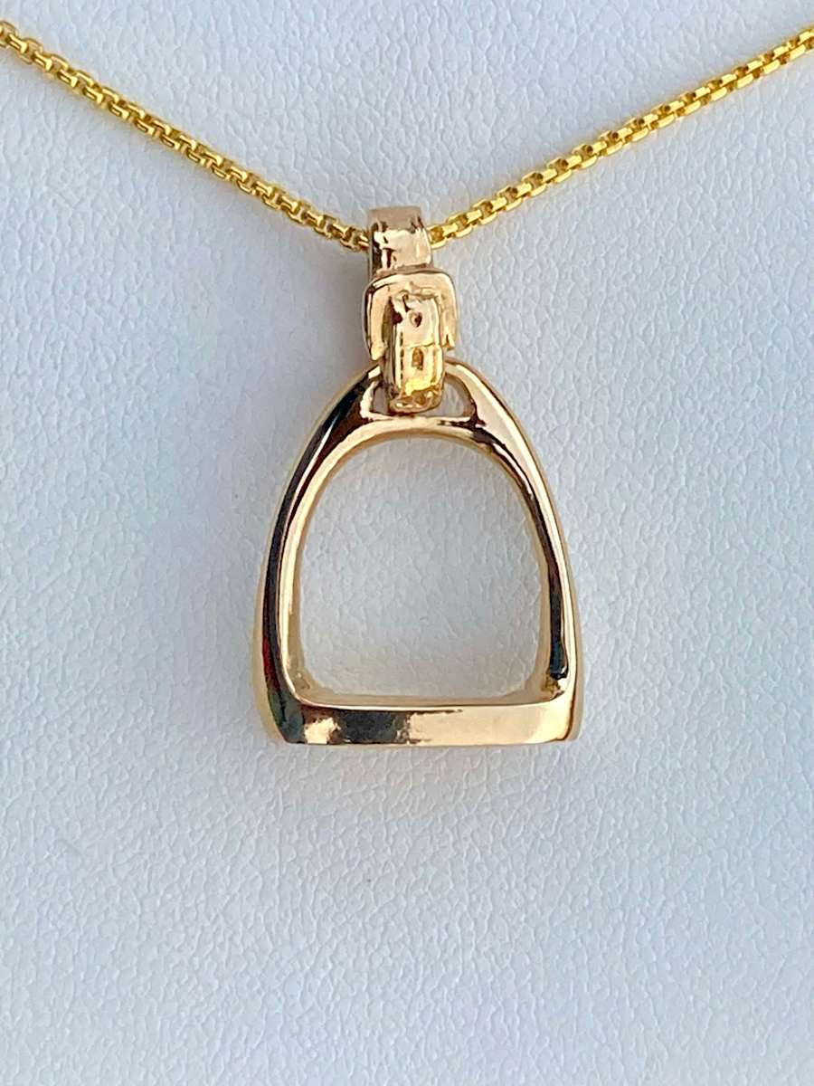Gold Stirrup by Salina Ramsay  Image: 14k solid gold stirrup pendant with strap bail