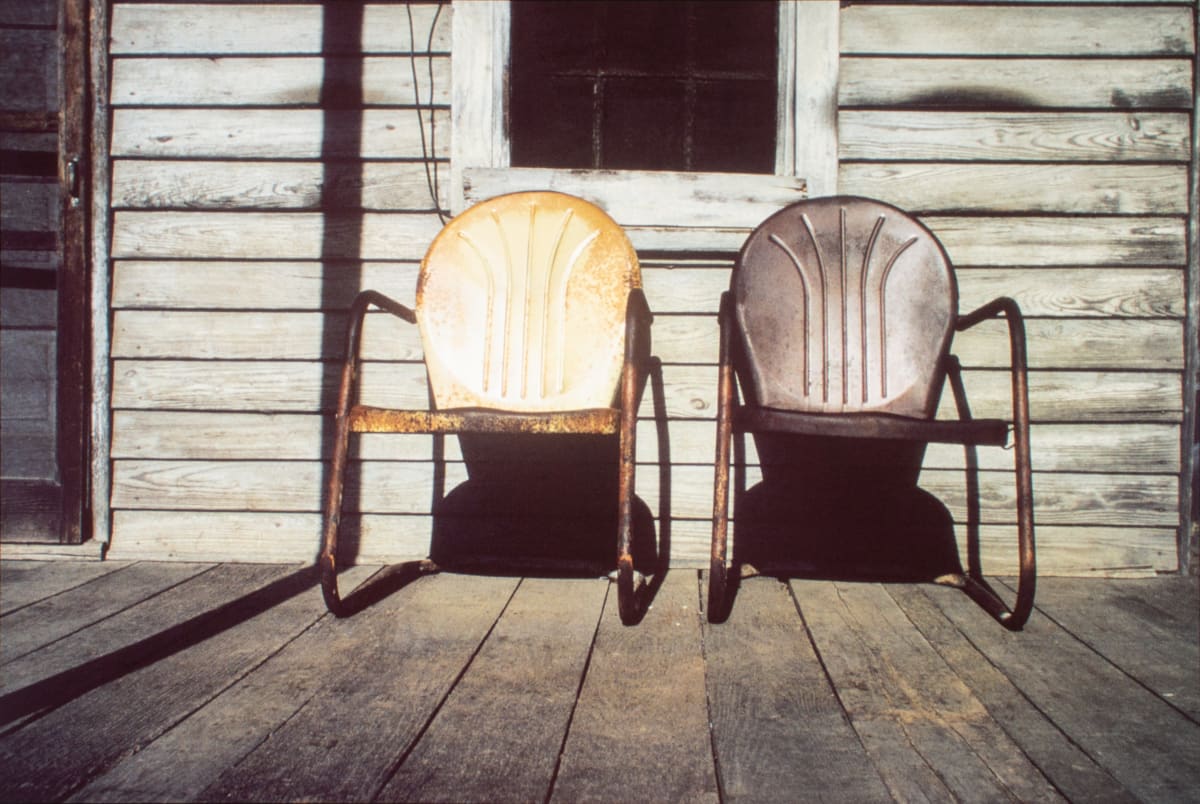 Metal chairs on front porch, Mississippi Delta, 1975 by William R. Ferris 