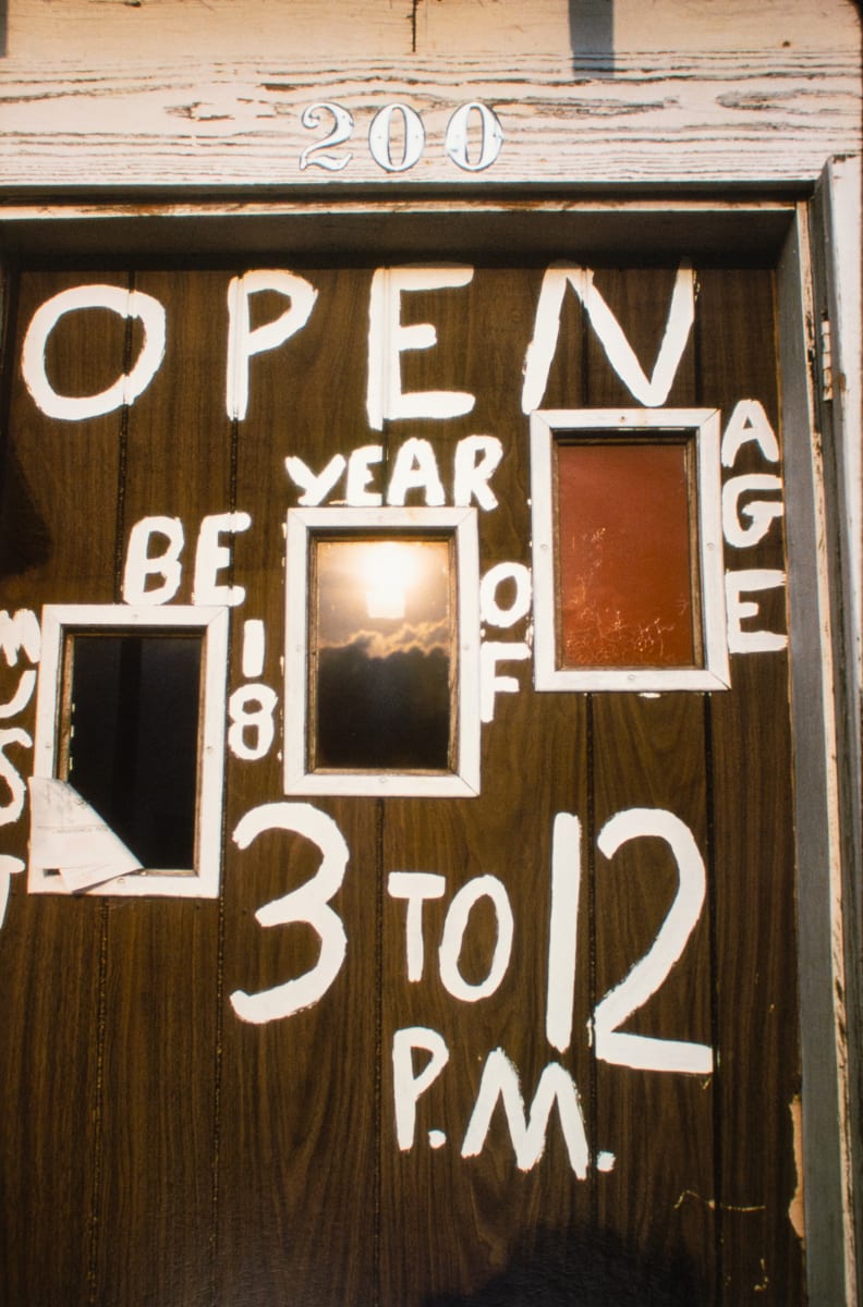 Painted door sign, Indianola, Mississippi, 1974 by William R. Ferris 