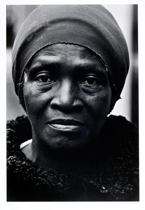 Black Woman, Rockefeller Center, N.Y.C. by Louis Stettner 