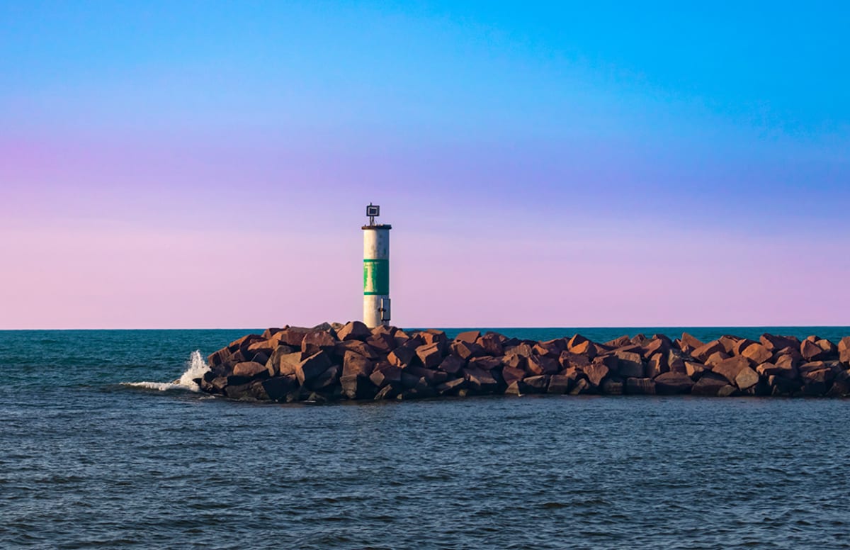 Portage Lighthouse Sunset by Rodney Buxton 