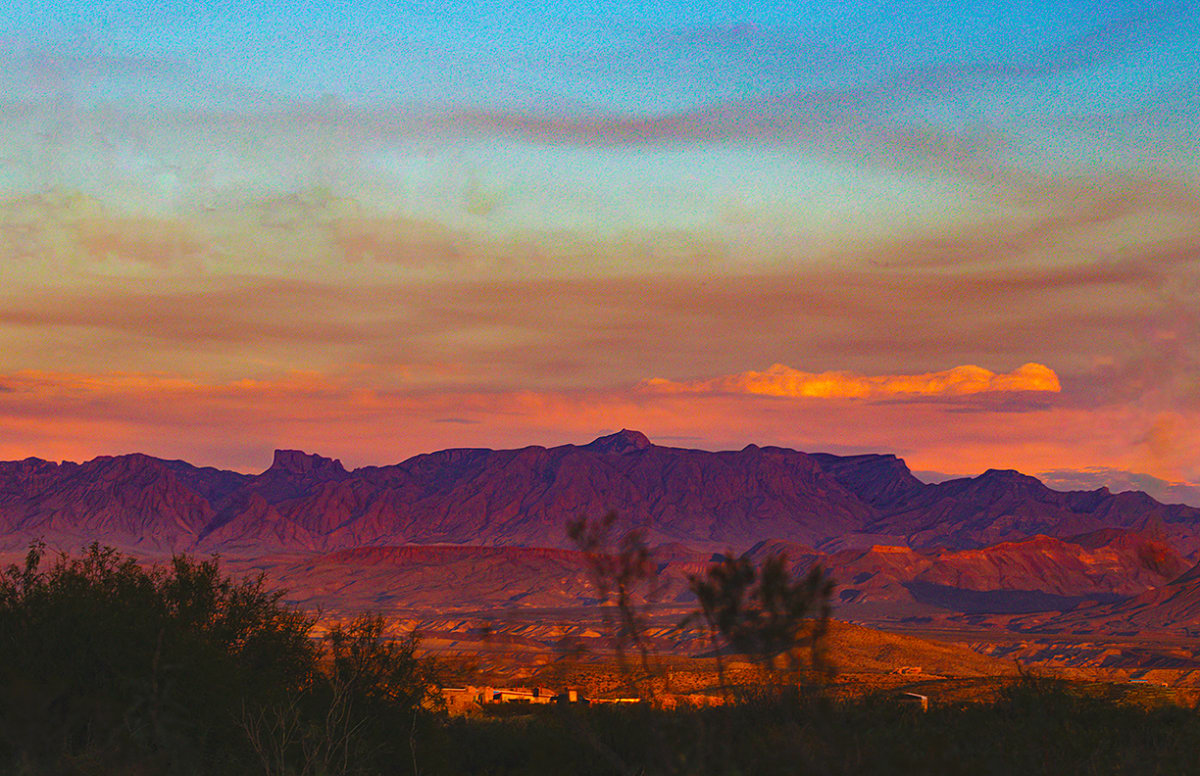 The Chisos from Terlingua Ghost Town, Sunset by Rodney Buxton 