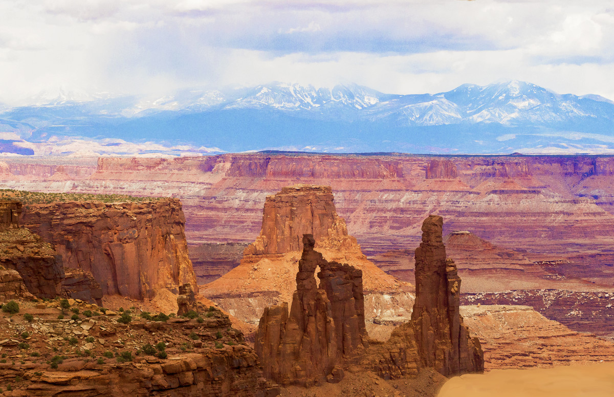 Washerwoman Arch and  Monster and Airport Towers and the La Salle Mountains Late Afternoon by Rodney Buxton 