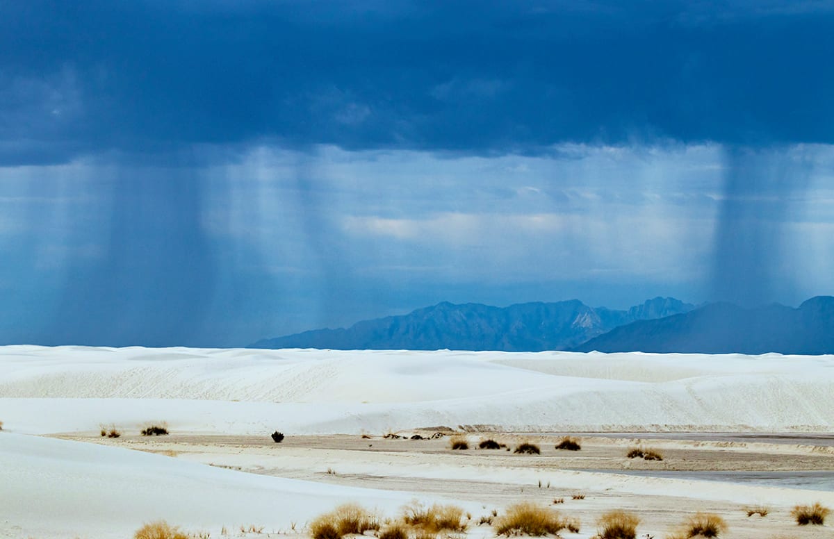 White Sands Morning Rainstorm by Rodney Buxton 
