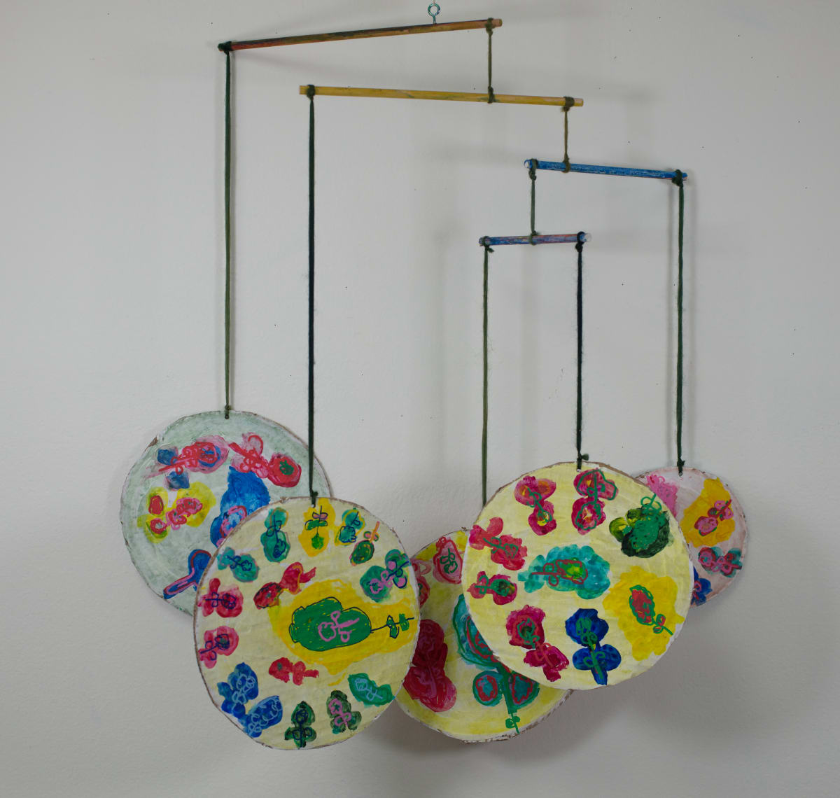 Painted Flower Mobile by Cathy  Pitzak  Image: two-sided paintings of flowers