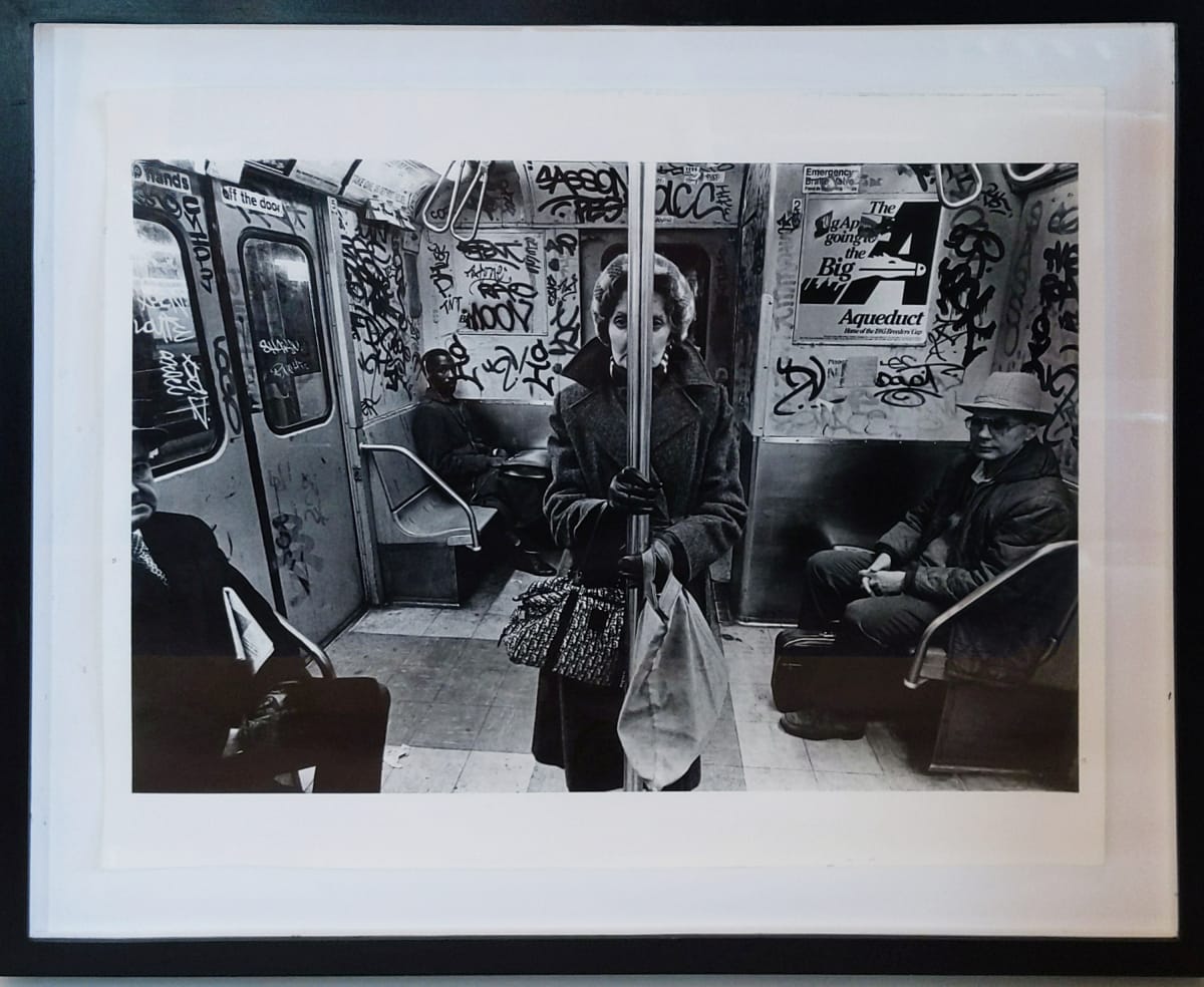 Woman Holding Subway Pole* by Richard Sandler 