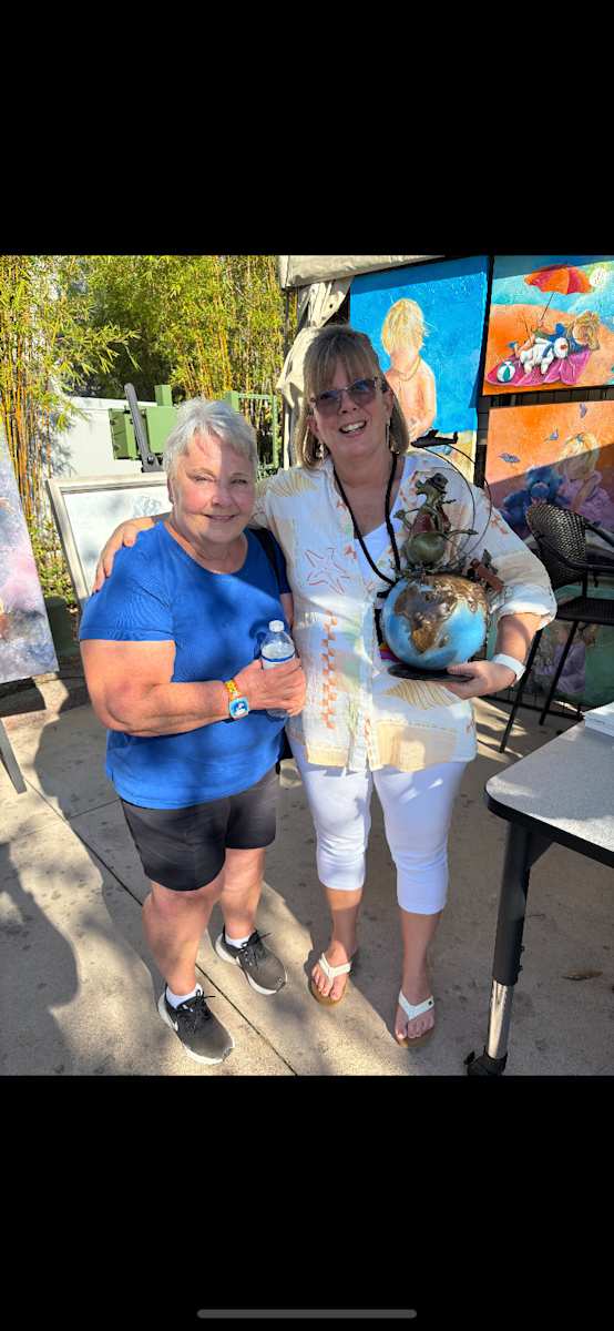 JACINTHE LACROIX. MASTER ARTIST AND SCULPTOR. NEW COLLECTOR AT THE EPCOT FESTIVAL OF THE ART OF GLOBE TROTTER TRAVELLING DRAGON by JACINTHE LACROIX. MASTER SCULPTOR AND ARTIST 