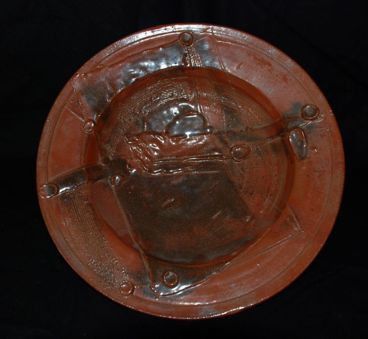 Plate in browns by John Heller 