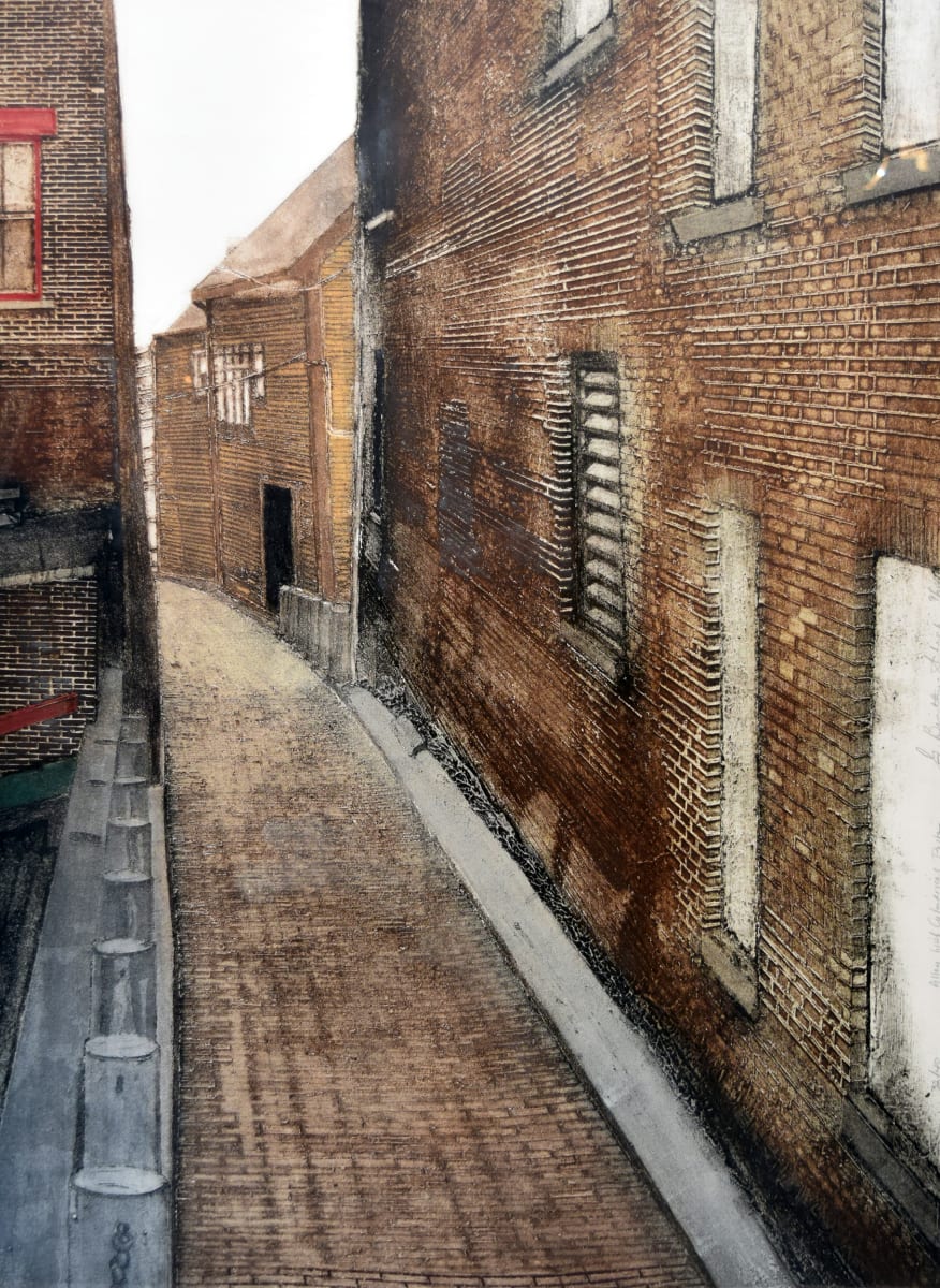 Alleyway with cylindrical posts by Grace Bentley-Scheck 