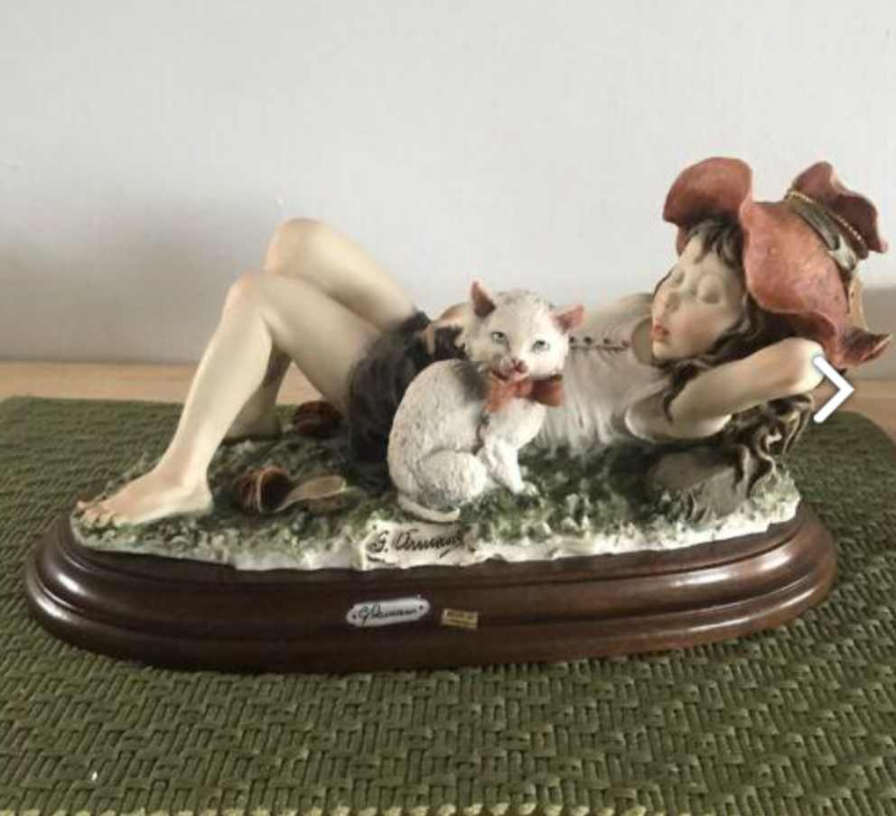 Sleeping Girl with her Cat by Giuseppe Armani  Image: Image from worthpoint