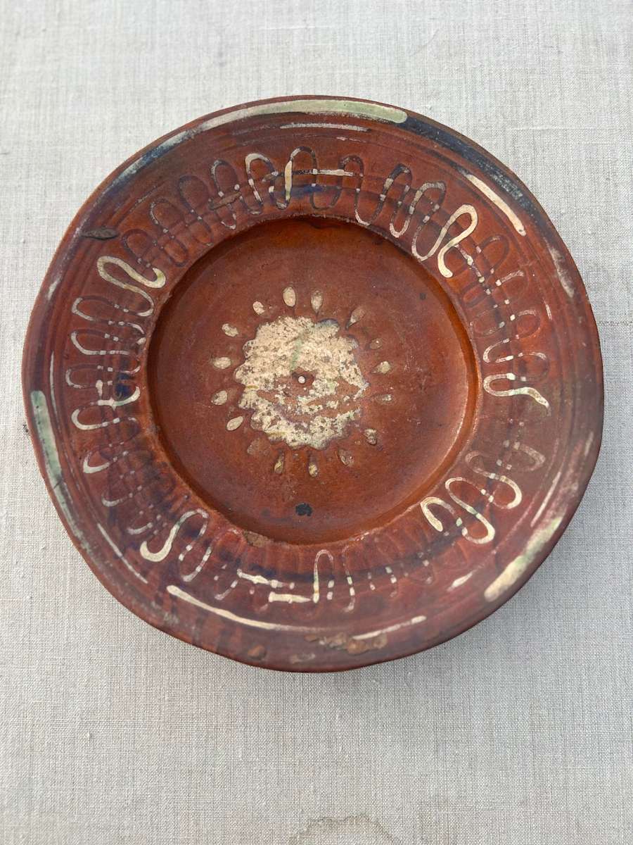 4 terracotta plates with fish (not pictured, similar in style to plate depicted) 