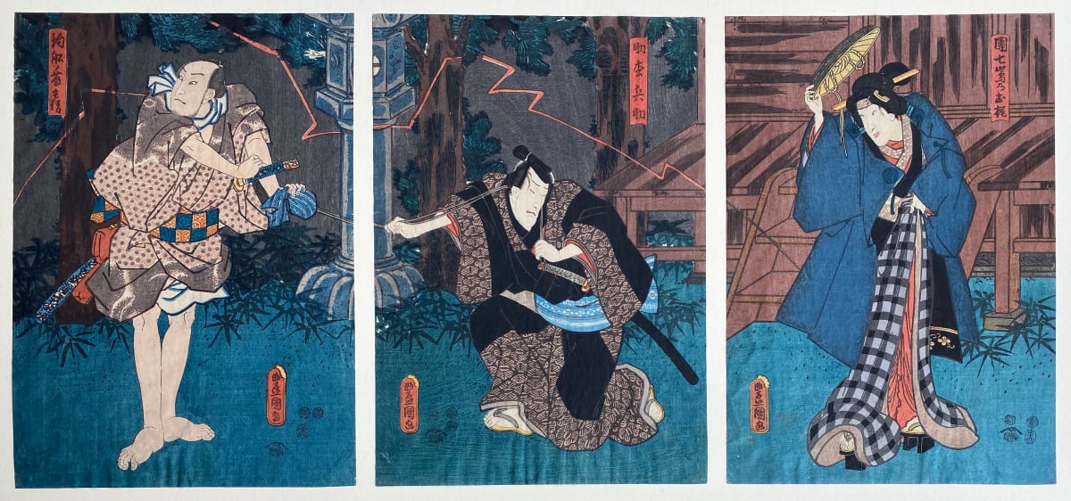 Two men in green woods, One lady by cabin 