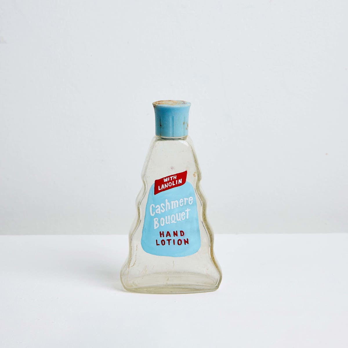Cashmere Bouquet Hand Lotion, Manufactured by Colgate-Palmolive-Peet Company, c. 1953 by Karen Mainenti 