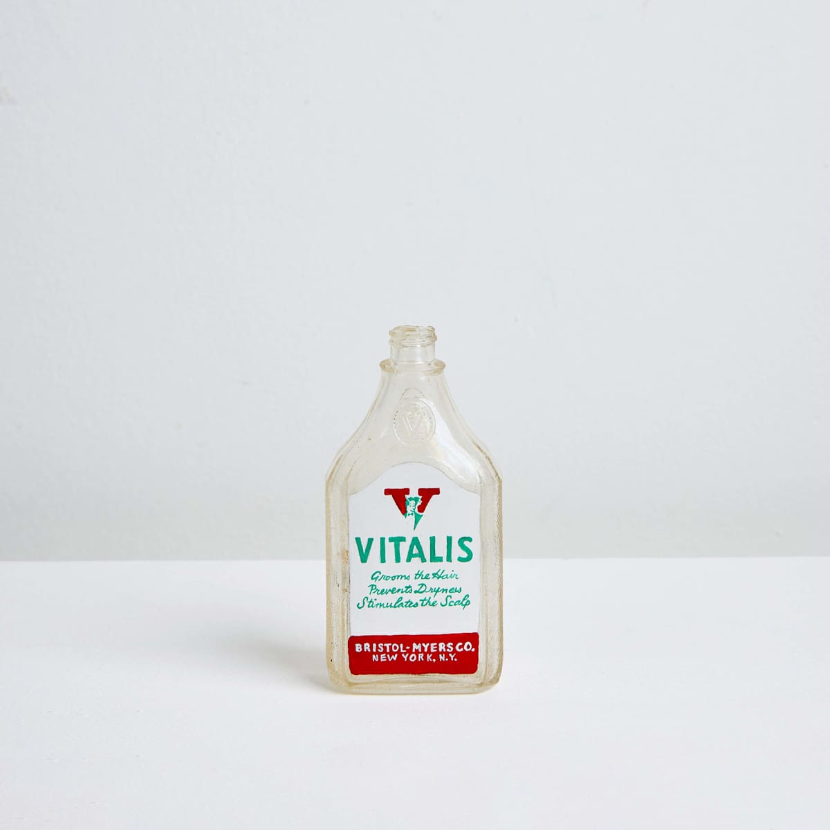 Vitalis Hair Tonic, Manufactured by Bristol-Myers Corp., c. 1951 by Karen Mainenti 