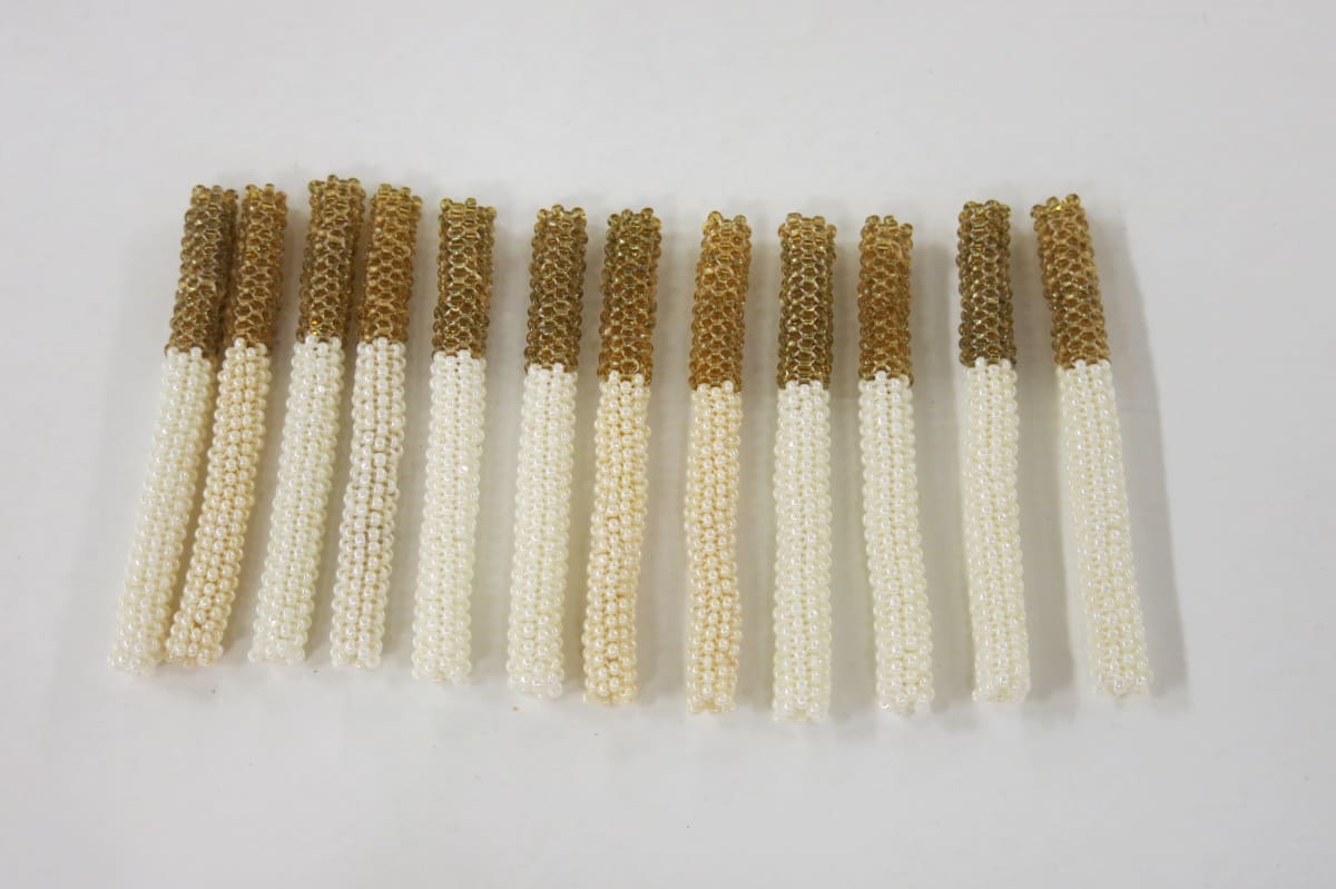 Cigarettes by Noelle Garcia  Image: Noelle Garcia 
"Cigarettes," 2015
Glass beads and thread
Marjorie Barrick Museum of Art Collection 
Gift of the artist