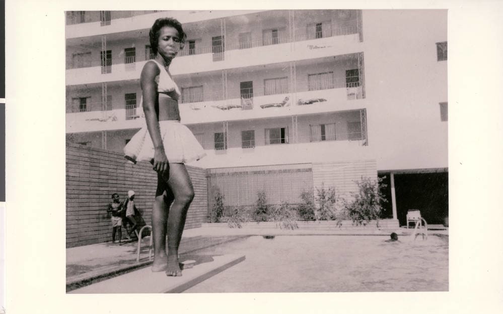 An Unidentified Woman on the Diving Board at Carver House Hotel and Casino 