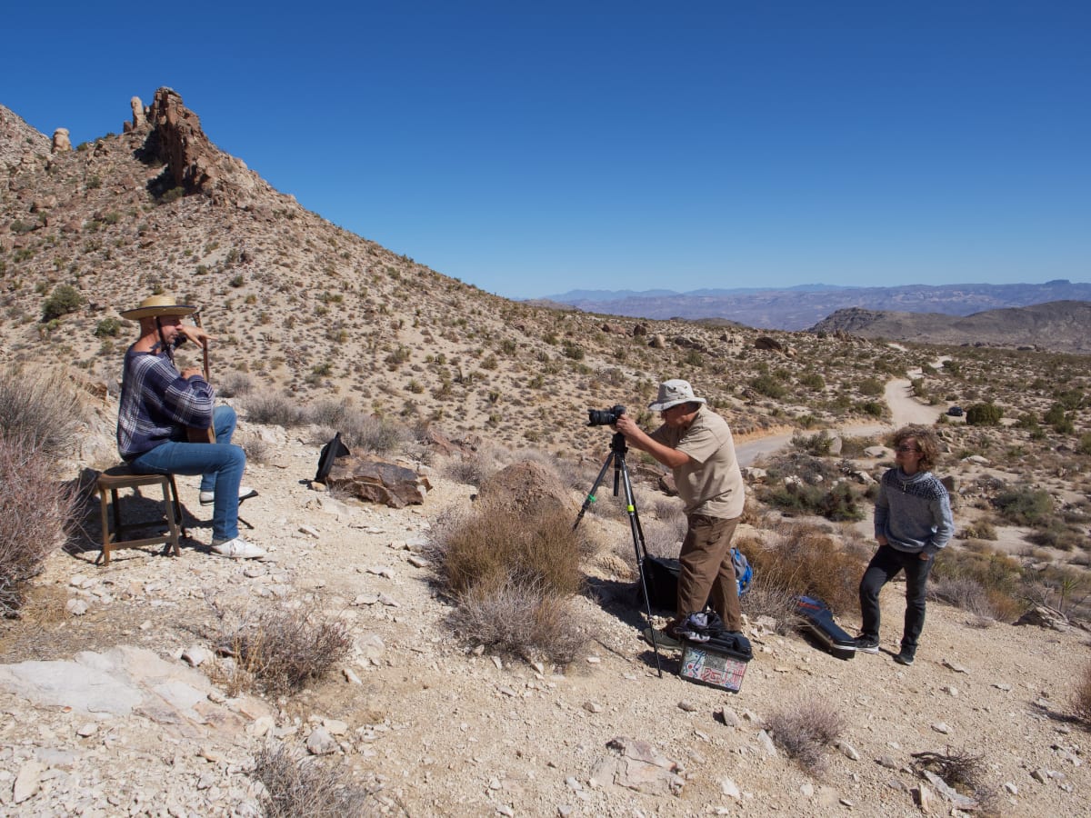 Acoustic Winds: On location in Avi Kwa Ame by Checko Salgado  Image: Checko Salgado filming Christopher Reitmaier and Jacob Luna playing at the base of Spirit Mountain.