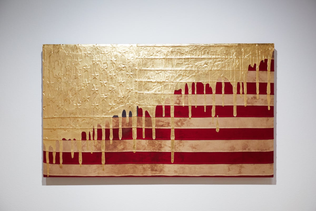Gold Dripping Flag by Andrew Schoultz  Image: Installation photo. Photo by Lonnie Timmons III/UNLV Creative Services.