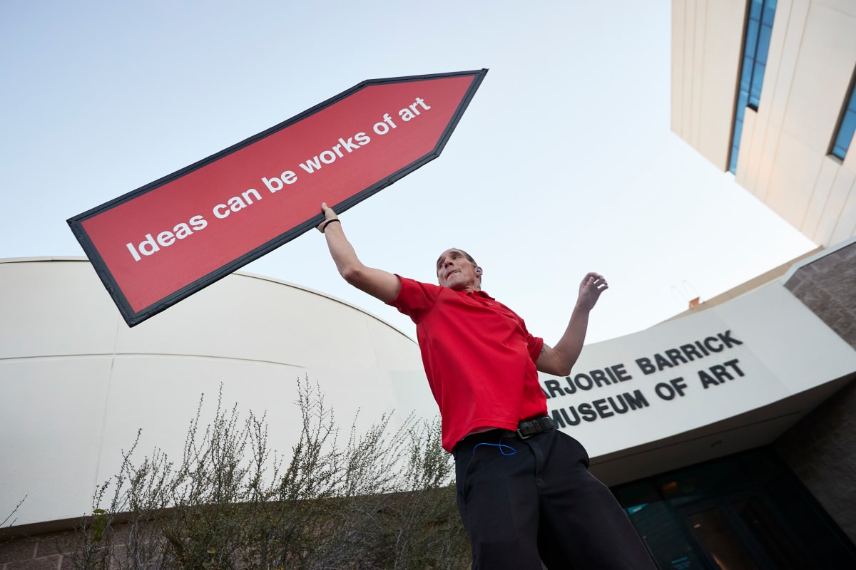 Spin (after Sol LeWitt) by Yumi Janairo Roth  Image: Arrow sign spinner Rayen Jones at UNLV College of Fine Art's Art Walk, 2021 (UNLV Creative Services/ Josh Hawkins).