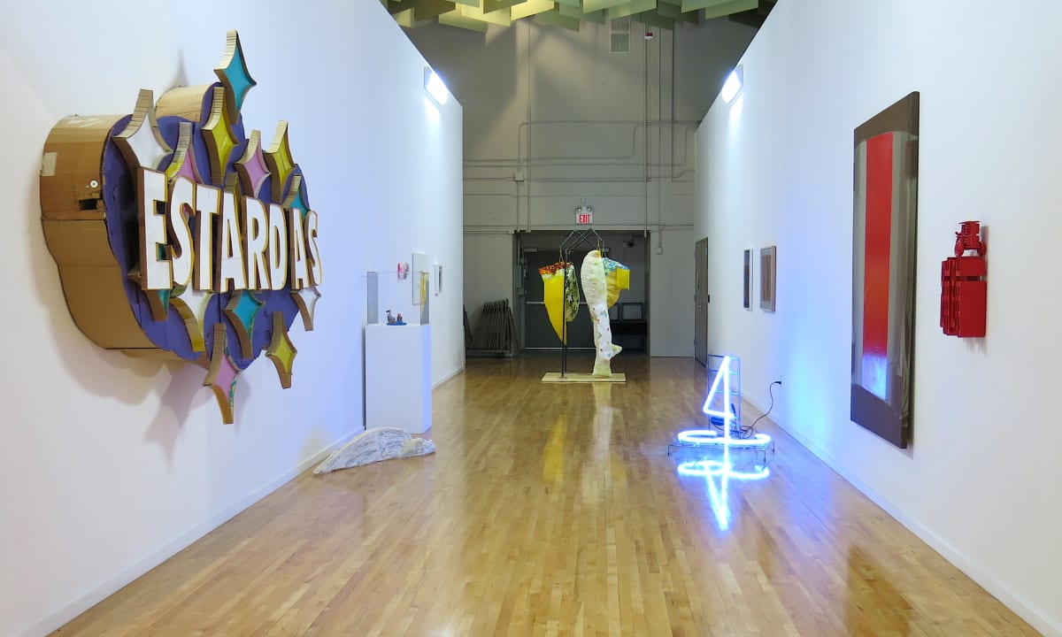 Installation shot of "Art in Context", looking down into the Workshop Gallery. 