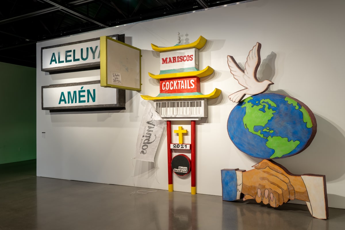 Bienvenidos by Justin Favela  Image: Justin Favela
Bienvenidos, 2022
Cardboard, paper, glue, and paint. 
Dimensions Variable
Courtesy of the Artist