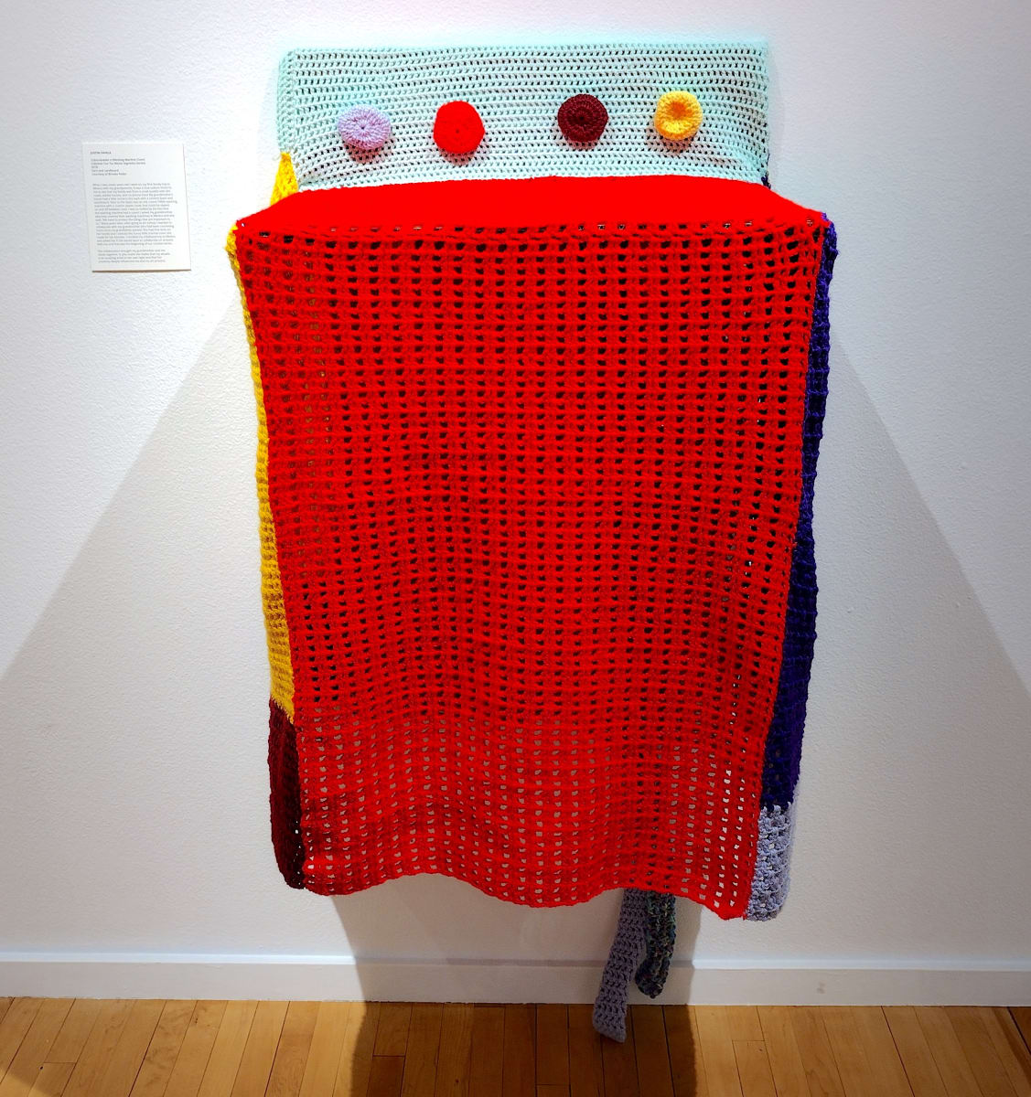 "Cubre-lavador a (Washing Machine Cover)" Cubreme Con Tus Manto Sagrados (series) by Justin Favela  Image: Justin Favela
"Cubre-lavador a (Washing Machine Cover)" Cubreme Con Tus Manto Sagrados (Series), 2018
Yarn and cardboard
Courtesy of Brooke Feder and Jesse Stuart