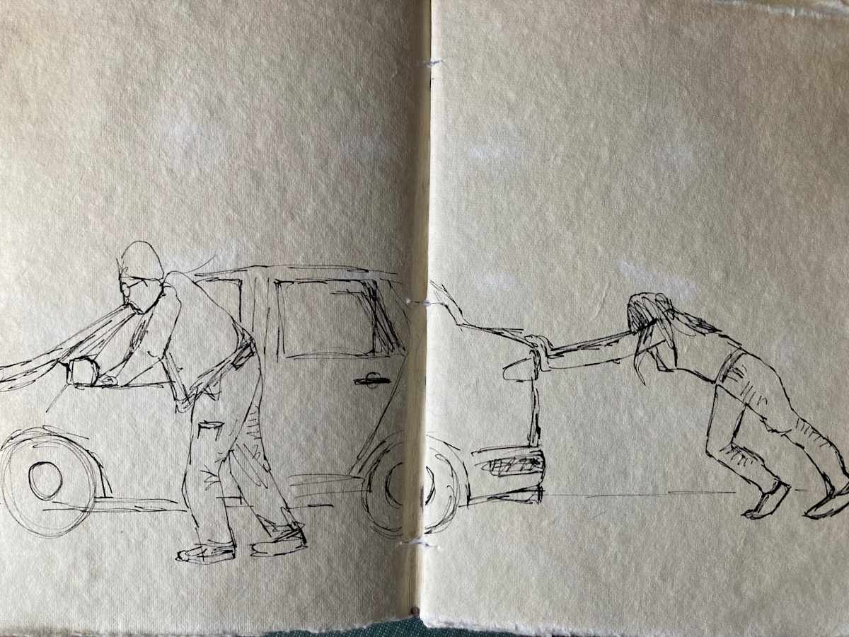Pushing the car by Fflur Donnghaile 